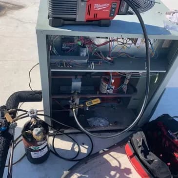 JIM Cooling & Heating technician in service